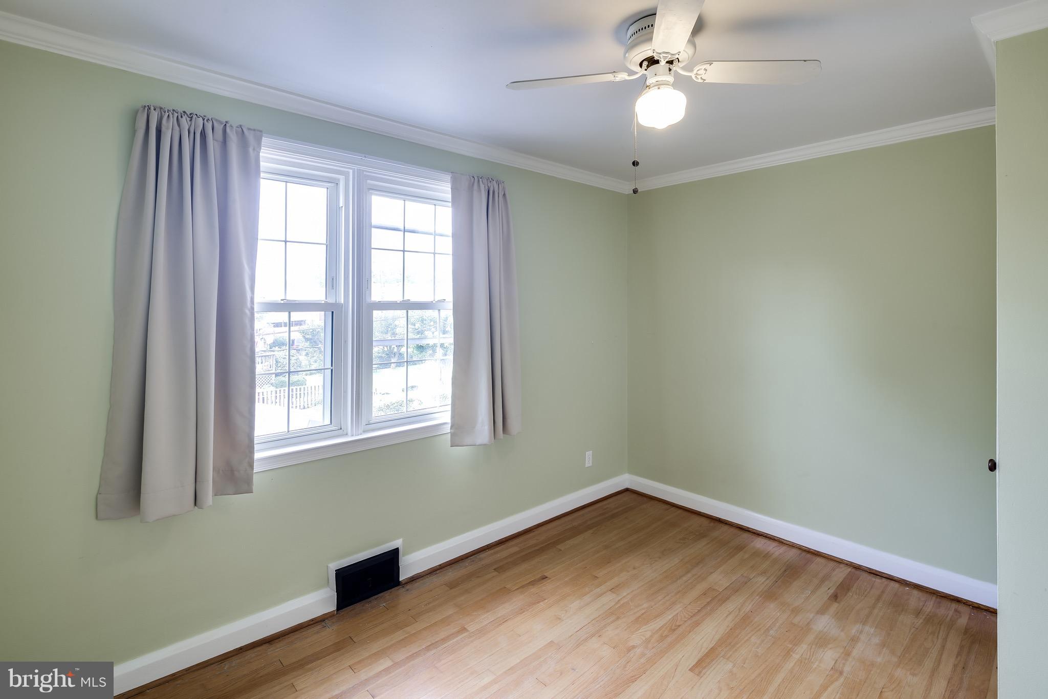 1611 Feldbrook Road Towson, MD 21286 - Photo 21 of 27 Bedroom Three w/ Hardwood & Lots of Light