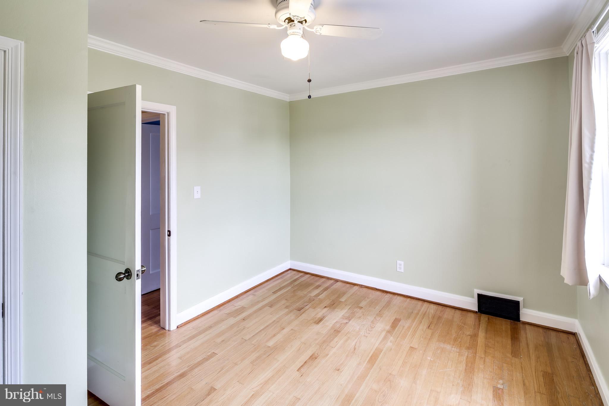 1611 Feldbrook Road Towson, MD 21286 - Photo 22 of 27 Bedroom Three w/ Hardwood & Lots of Light
