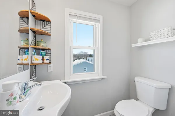 a bathroom with a sink and a toilet