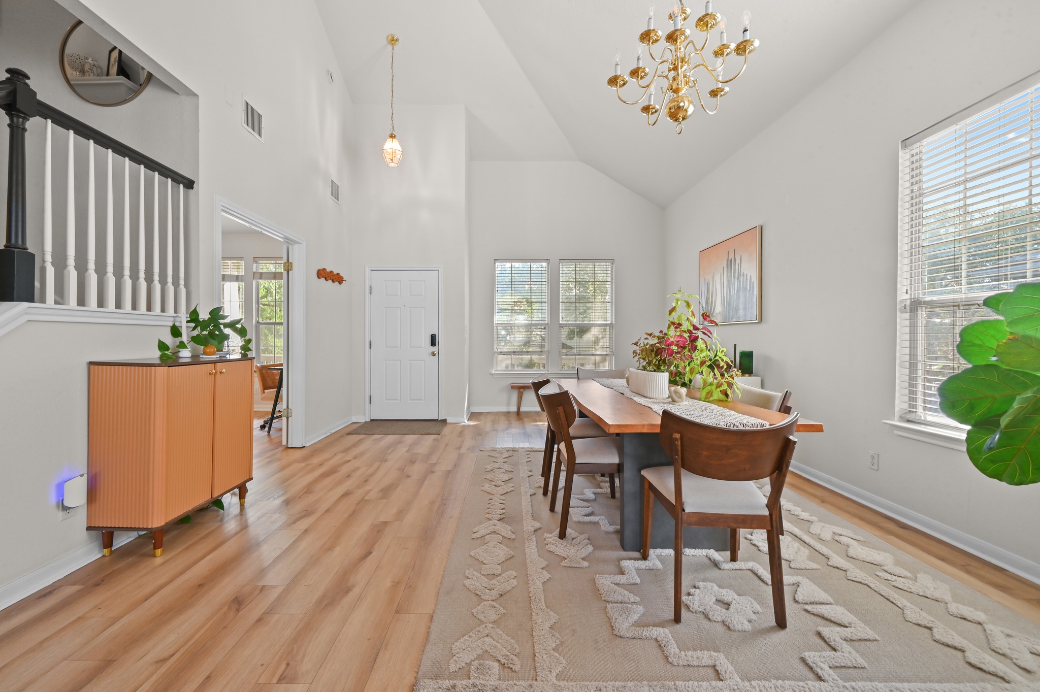 5888 Fergus Kyle, TX 78640 - Photo 35 of 40 Vast vaulted ceilings complement an inviting dining space with natural light.