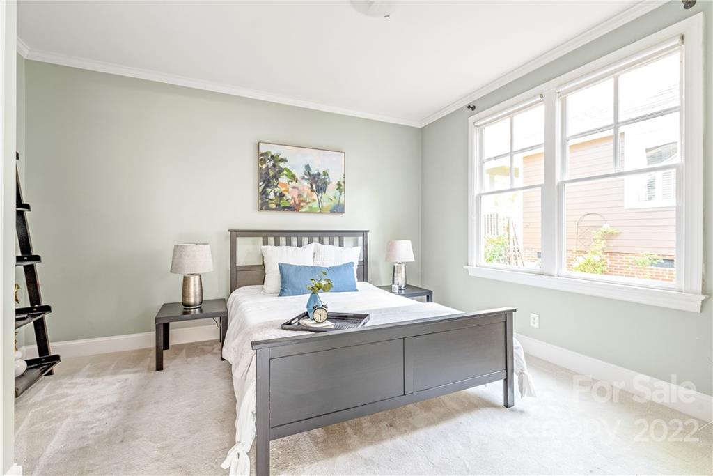 2208 Club Road Charlotte, NC 28205 - Photo 11 of 25 a view of a workspace with furniture and a window