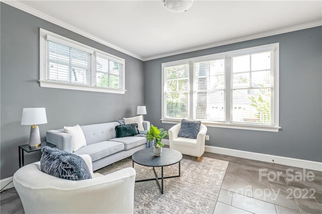 2208 Club Road Charlotte, NC 28205 - Photo 12 of 25 a living room with furniture and a large window