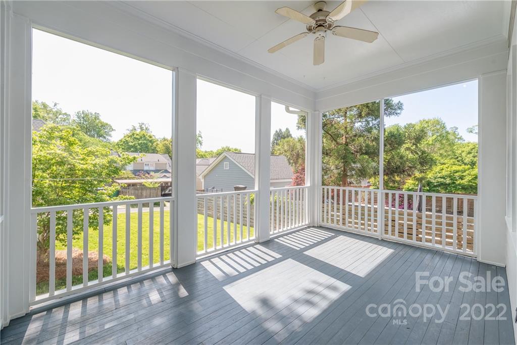 2208 Club Road Charlotte, NC 28205 - Photo 22 of 25 a view of a room with wooden floor windows and outdoor view