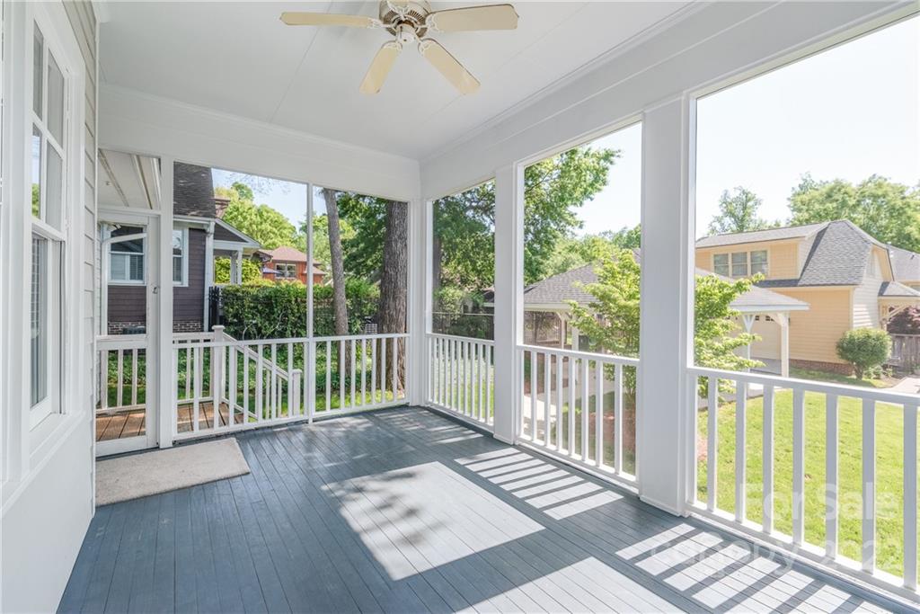 2208 Club Road Charlotte, NC 28205 - Photo 23 of 25 a view of a room with wooden floor and windows