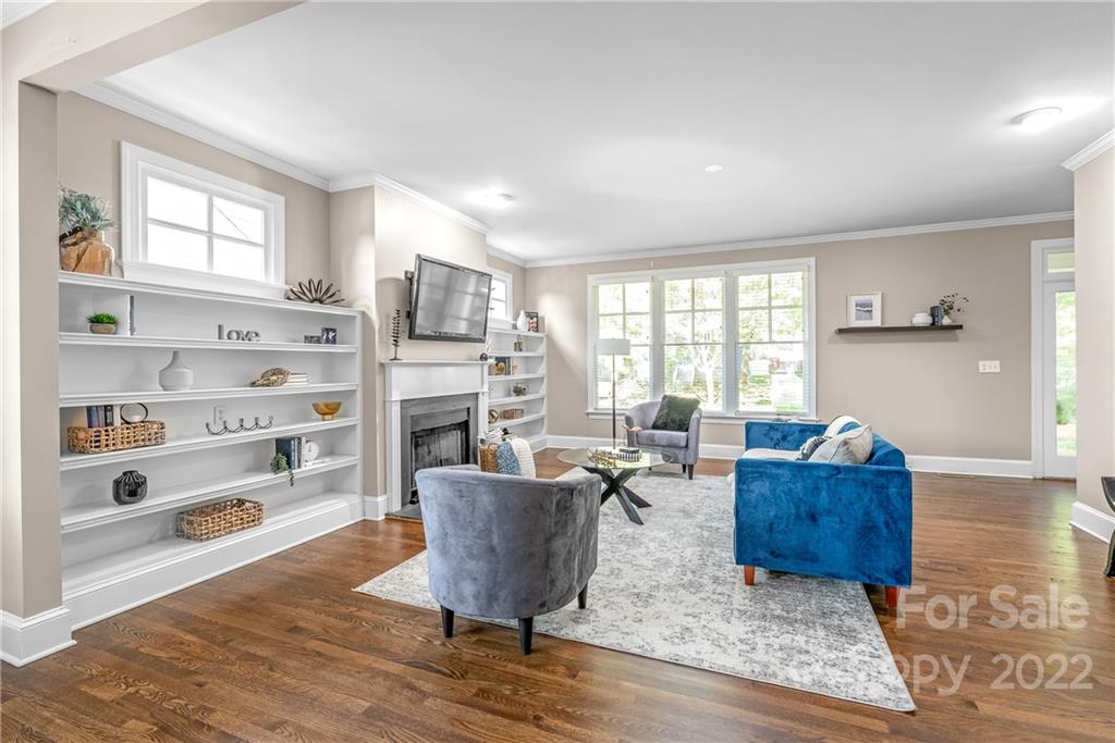 2208 Club Road Charlotte, NC 28205 - Photo 4 of 25 a living room with furniture window and wooden floor