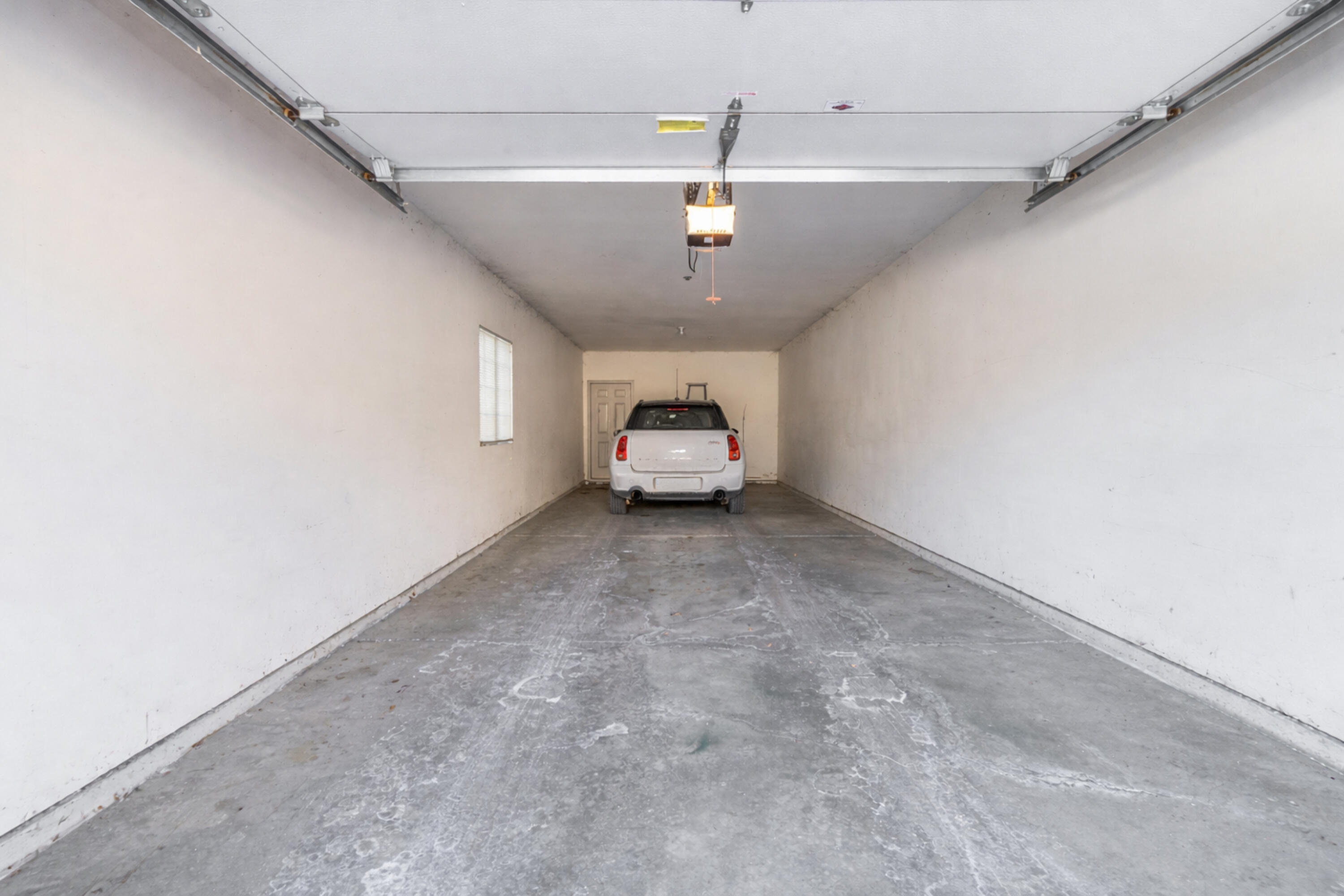 4869 South Forest Ridge Drive, Unit 17 New Berlin, WI 53151 - Photo 19 of 25 2 car tandem garage with room for storage