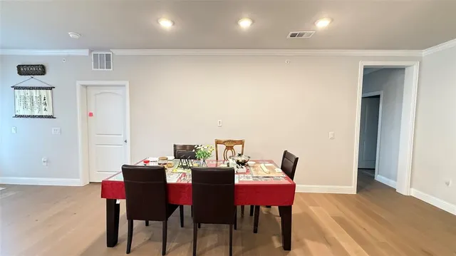 a view of a dining room with furniture