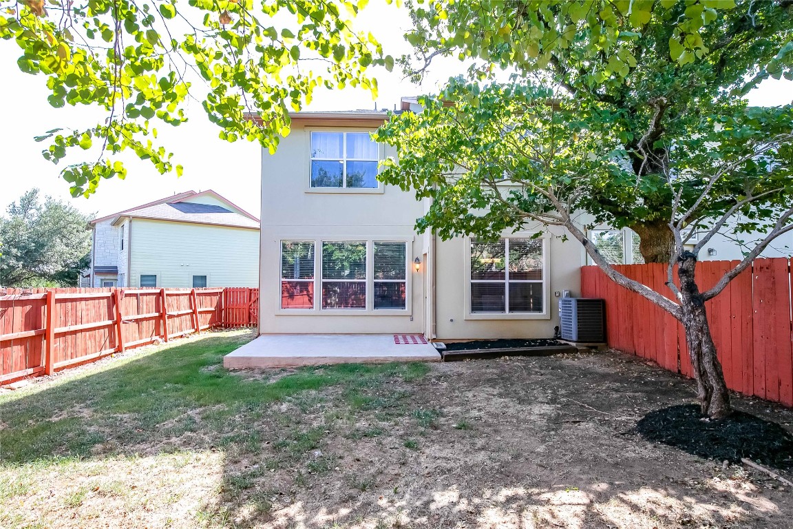 2410 Great Oaks Drive, Unit 804 Round Rock, TX 78681 - Photo 27 of 37 a front view of a house with garden