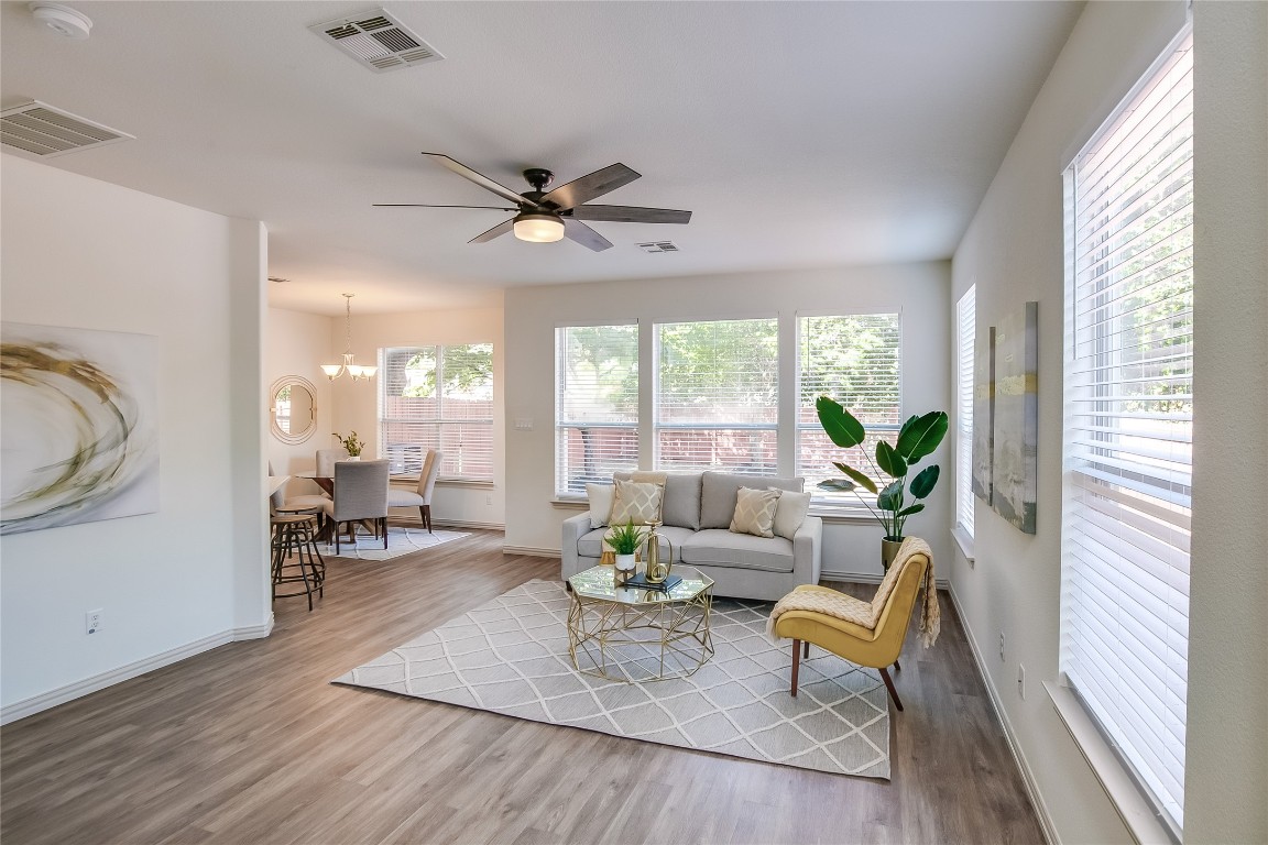 2410 Great Oaks Drive, Unit 804 Round Rock, TX 78681 - Photo 7 of 37 a living room with furniture and a large window