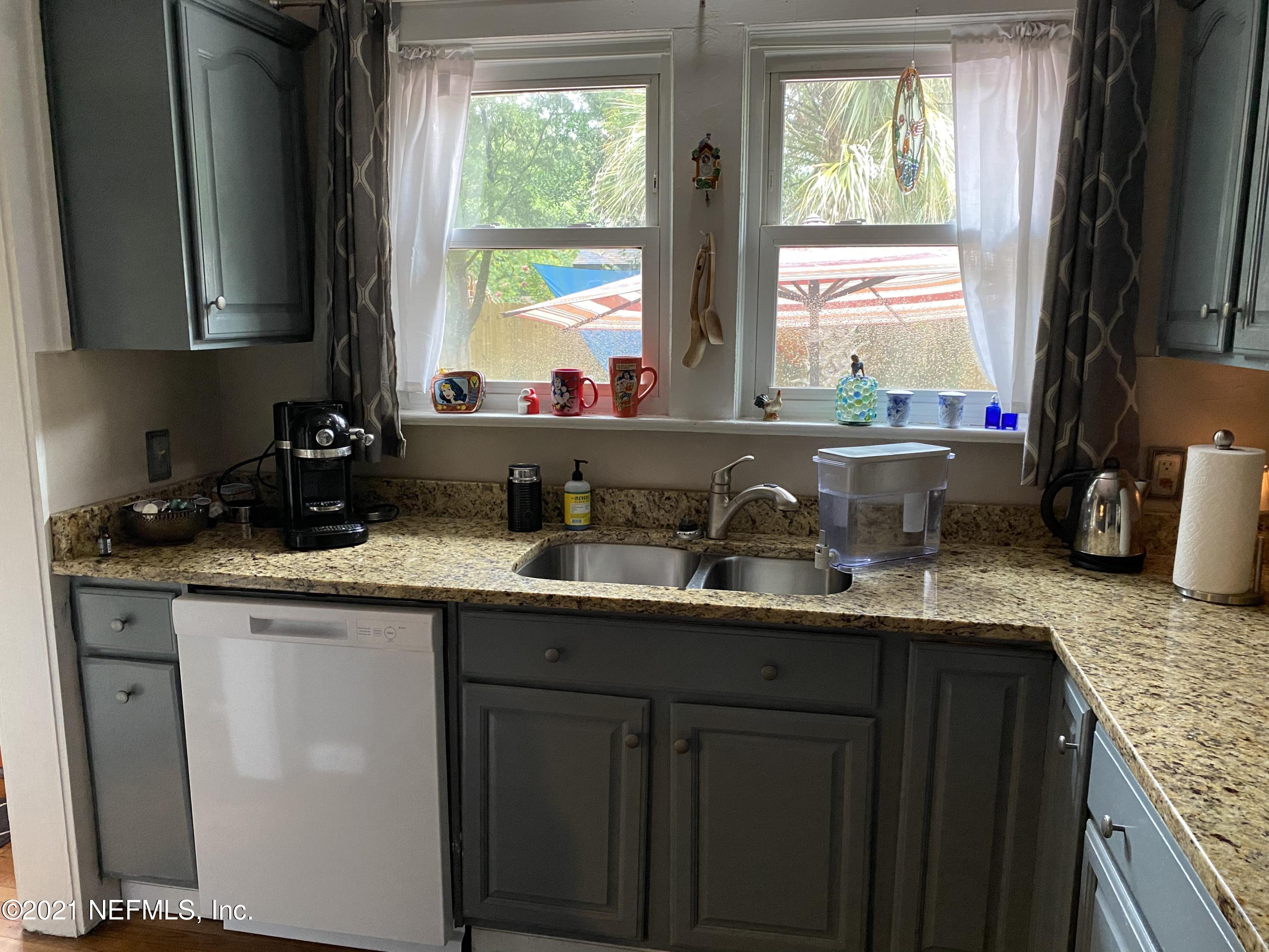 4745 Birkenhead Road Jacksonville, FL 32210 - Photo 32 of 77 Kitchen overlooking backyard