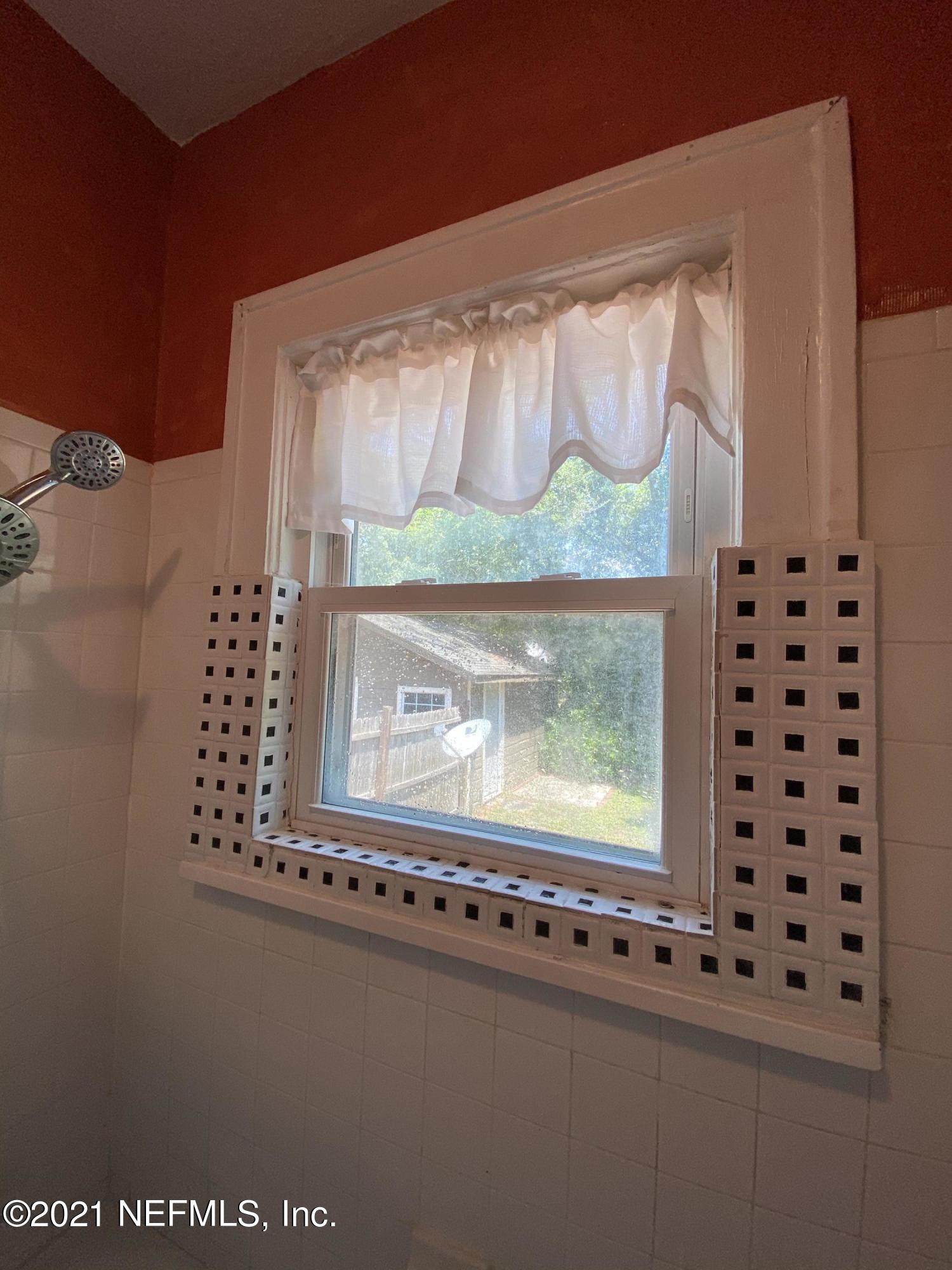 4745 Birkenhead Road Jacksonville, FL 32210 - Photo 45 of 77 Bathroom Window to backyard