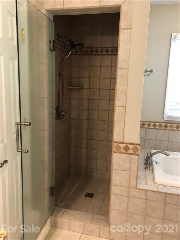 4516 Kiser Island Road Terrell, NC 28682 - Photo 11 of 19 a bathroom with a shower and a sink