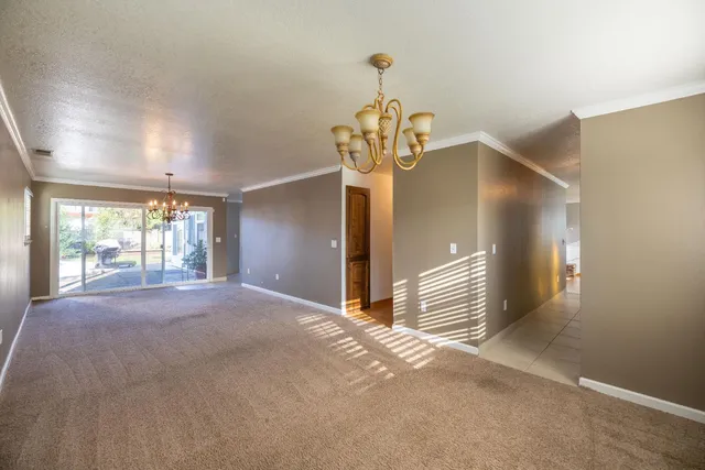 a view of an empty room with a sliding door