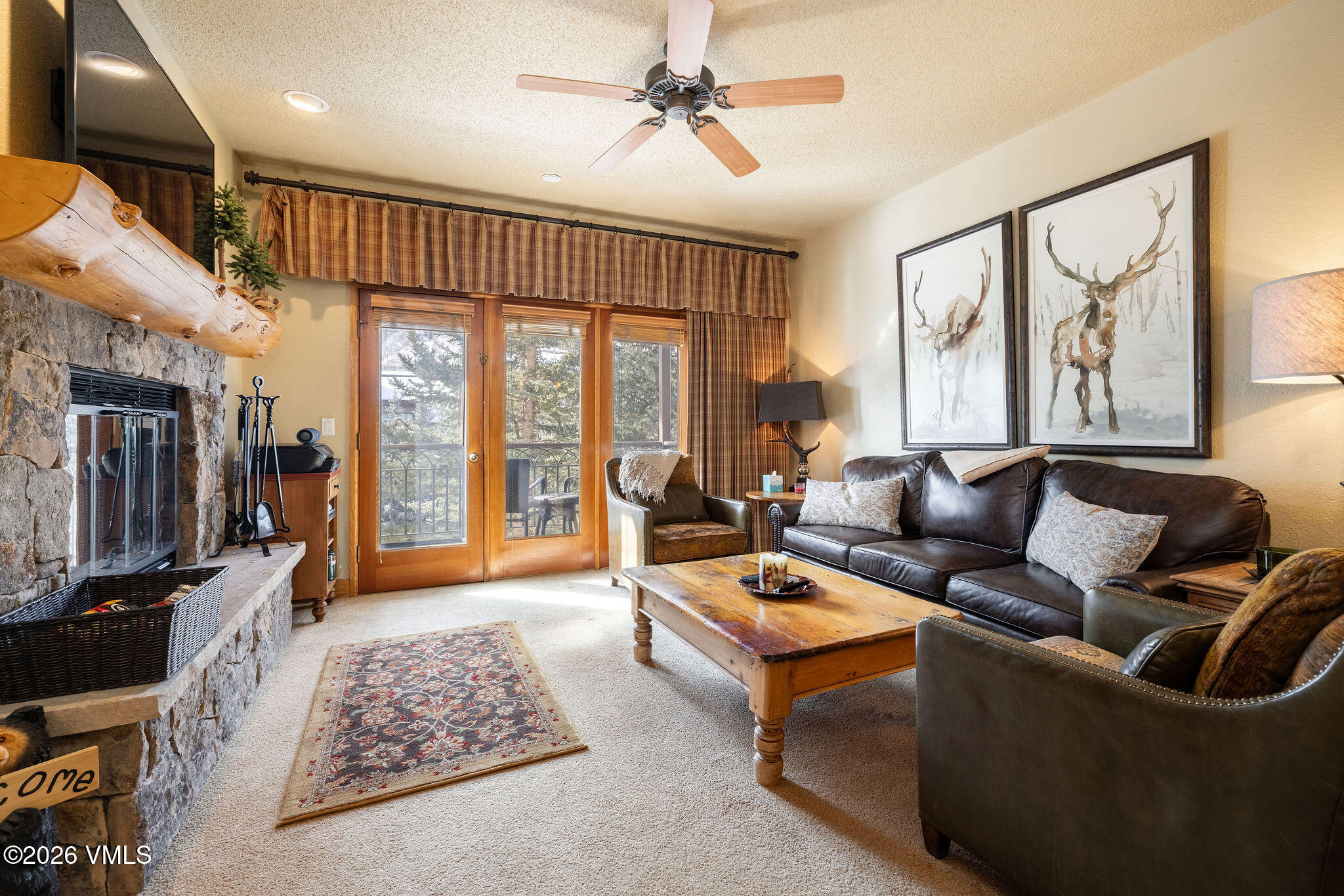 120 Offerson Road, Unit 7220/25 Beaver Creek, CO 81620 - Photo 11 of 17 a living room with furniture and a flat screen tv