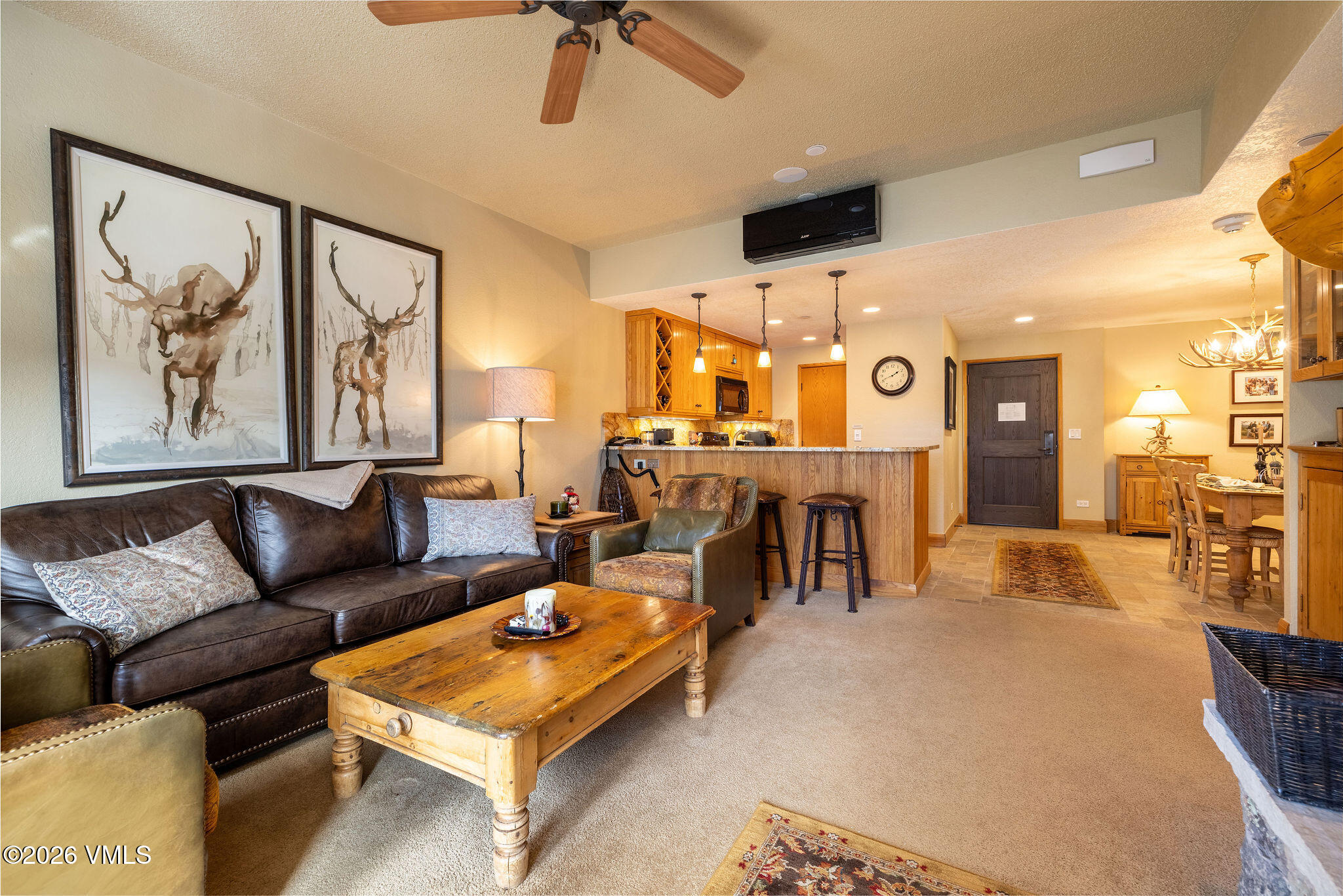 120 Offerson Road, Unit 7220/25 Beaver Creek, CO 81620 - Photo 12 of 17 a living room with furniture and a flat screen tv