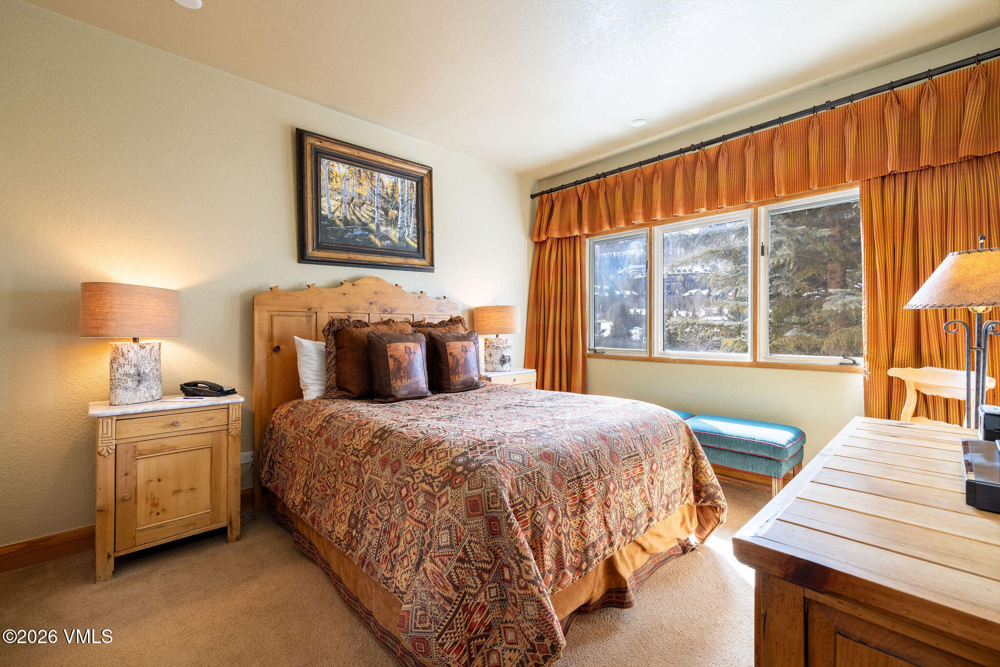 120 Offerson Road, Unit 7220/25 Beaver Creek, CO 81620 - Photo 14 of 17 a bedroom with a bed and glass windows