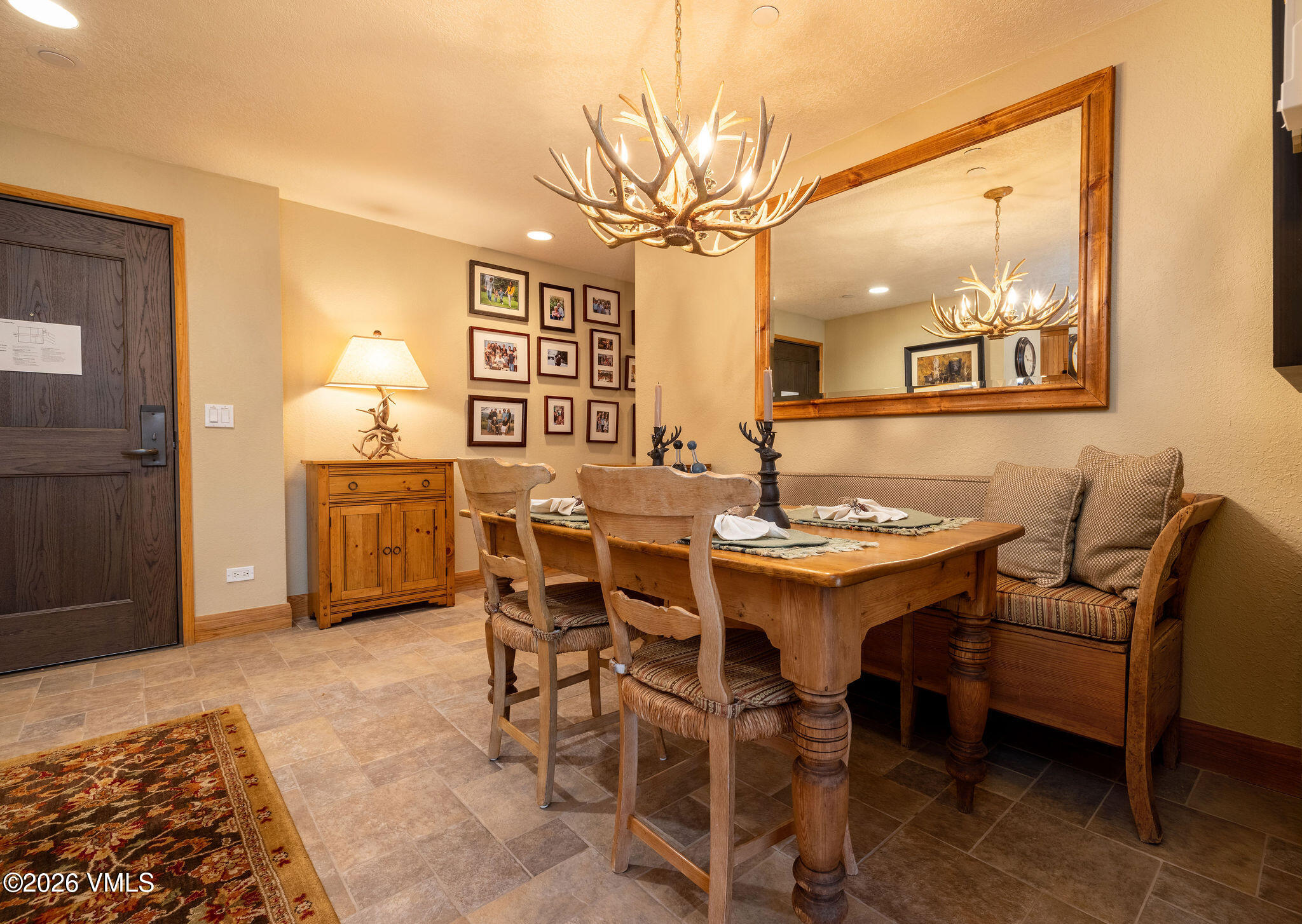 120 Offerson Road, Unit 7220/25 Beaver Creek, CO 81620 - Photo 8 of 17 a dining room with a table and chairs