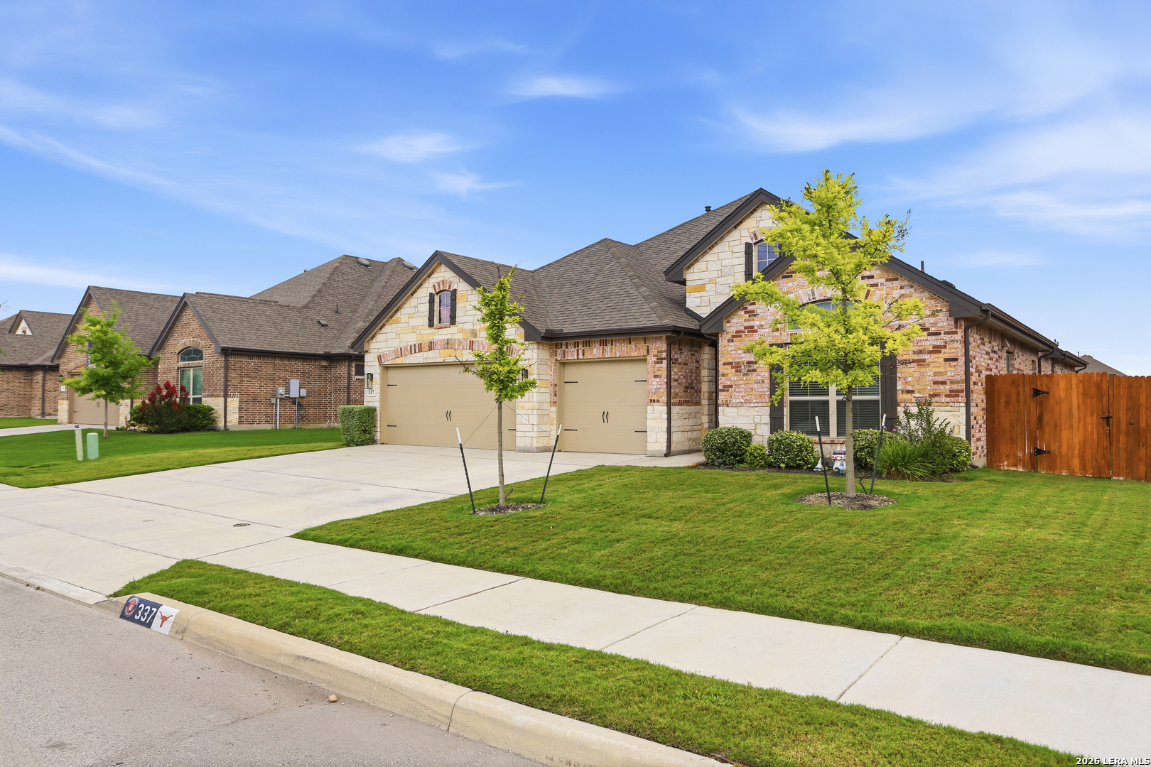 337 Misty Sails Cibolo, TX 78108 - Photo 5 of 50 a front view of a house with a yard