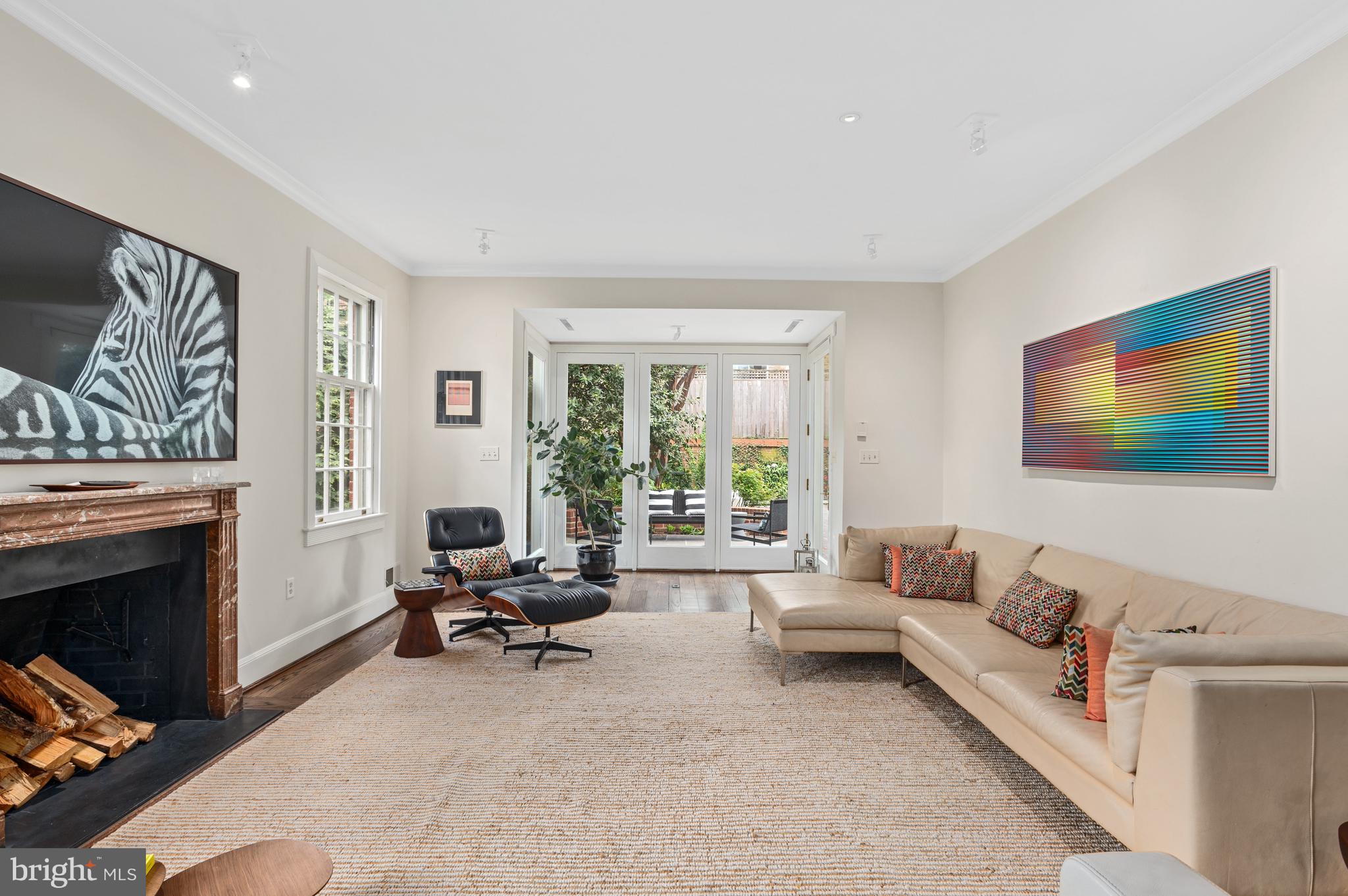 2468 Belmont Road Northwest Washington, DC 20008 - Photo 12 of 49 a living room with furniture and a fireplace