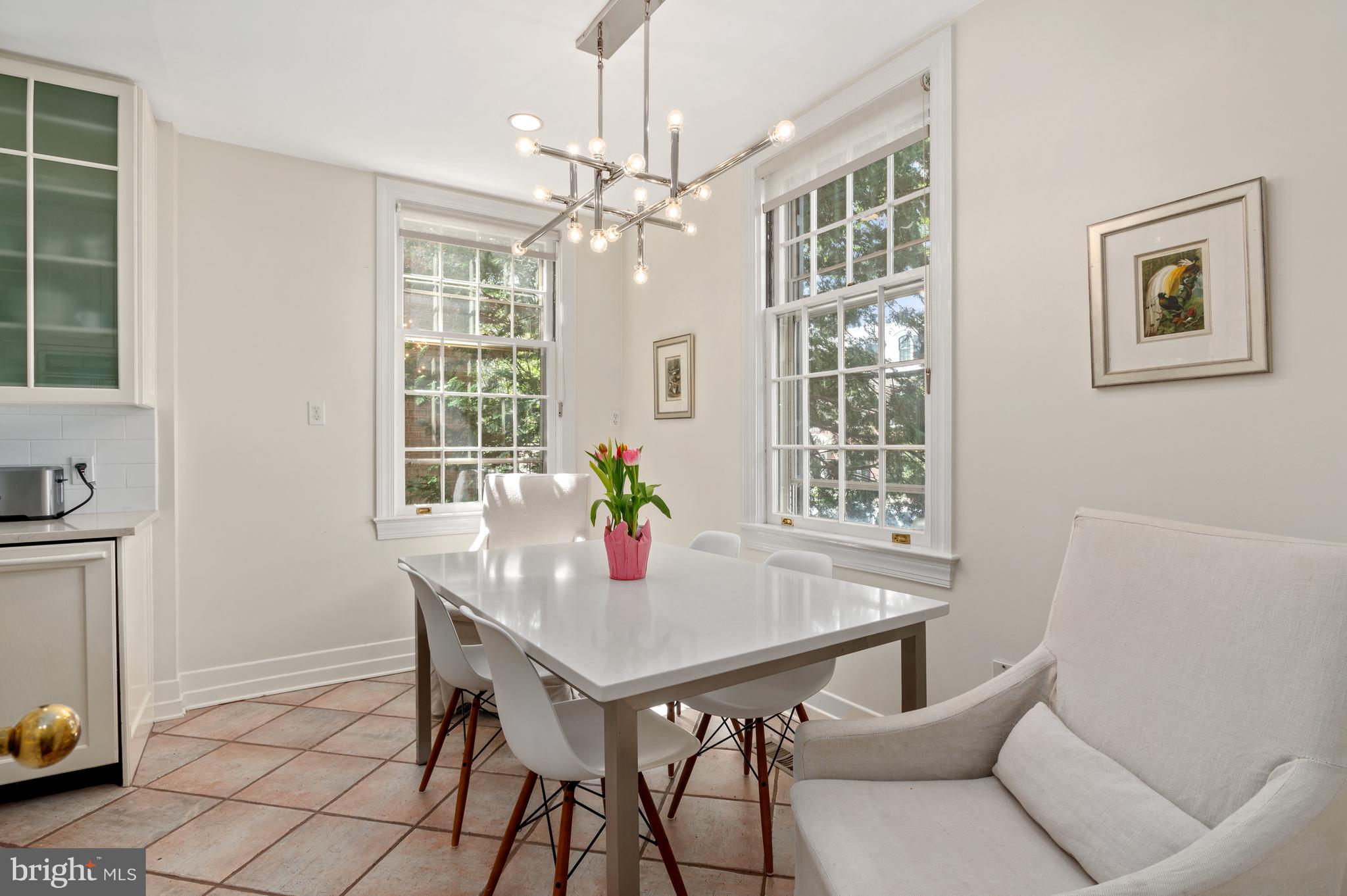 2468 Belmont Road Northwest Washington, DC 20008 - Photo 19 of 49 a view of a dining room with furniture window and outside view