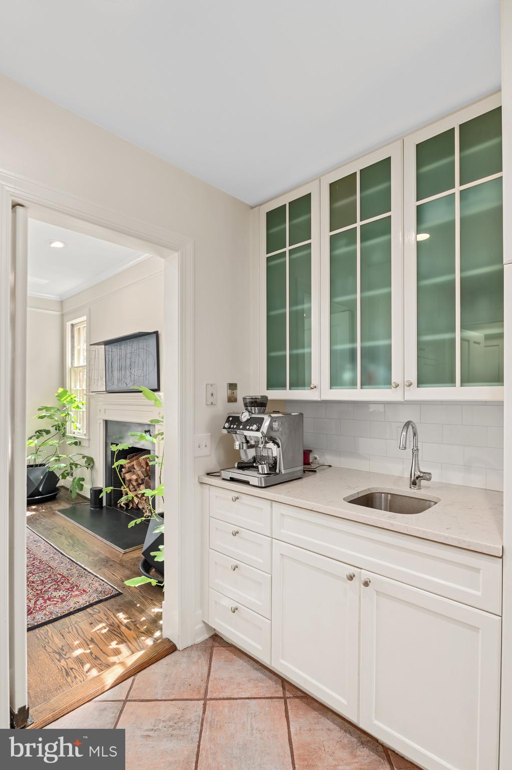 2468 Belmont Road Northwest Washington, DC 20008 - Photo 24 of 49 a view of a center kitchen and a sink