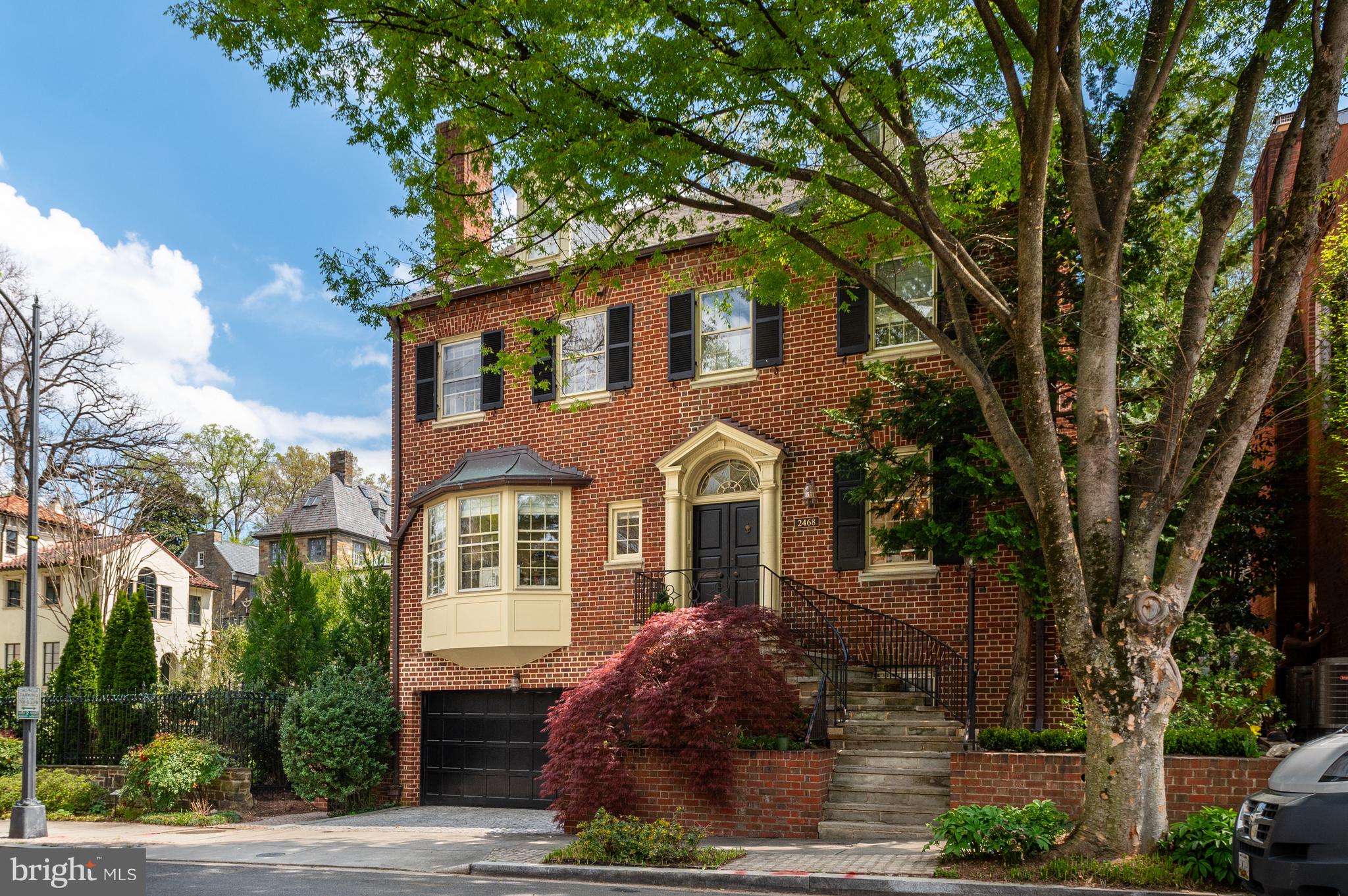 2468 Belmont Road Northwest Washington, DC 20008 - Photo 3 of 49 a front view of a house with a tree