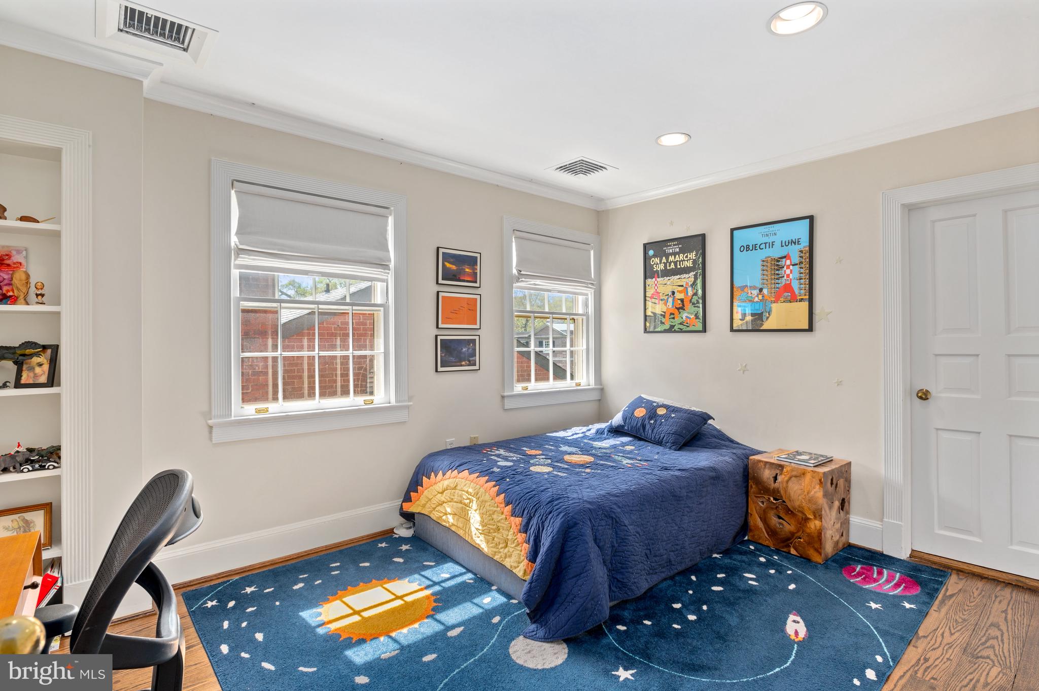 2468 Belmont Road Northwest Washington, DC 20008 - Photo 31 of 49 a bedroom with bed and a window