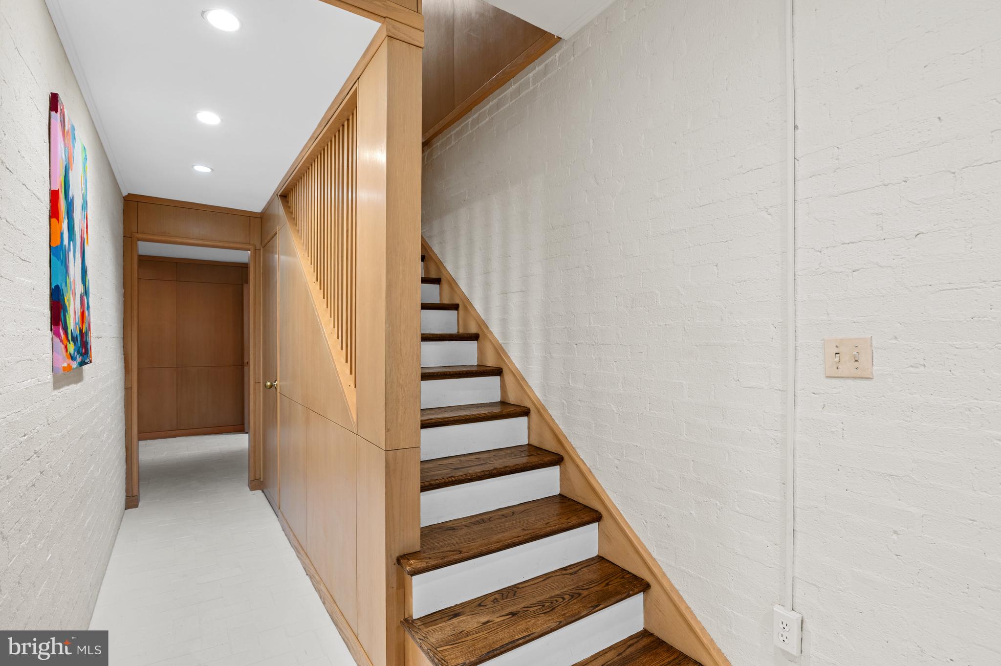2468 Belmont Road Northwest Washington, DC 20008 - Photo 32 of 49 a view of entryway with wooden floor