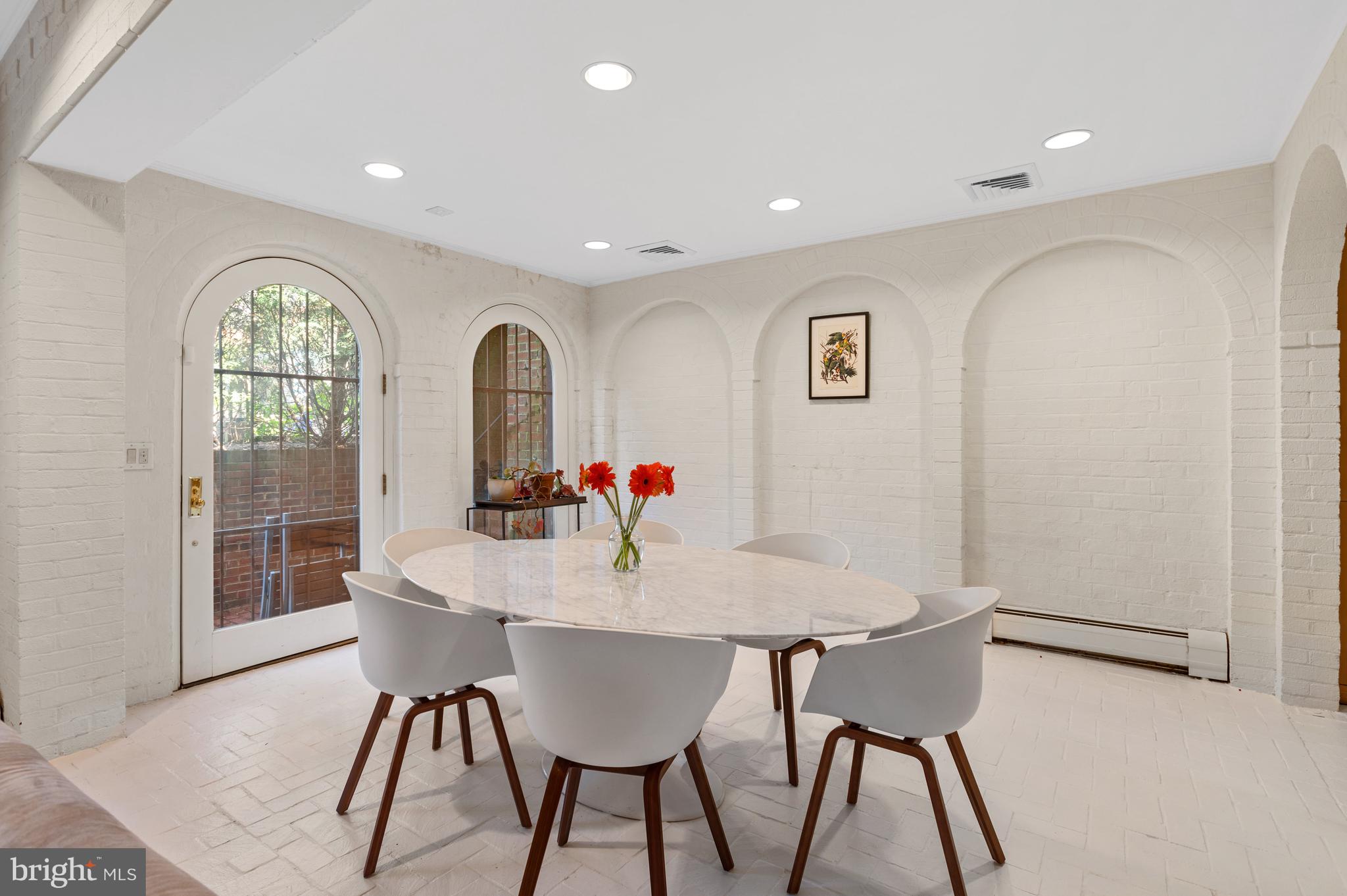 2468 Belmont Road Northwest Washington, DC 20008 - Photo 36 of 49 a view of a dining room with furniture and a window