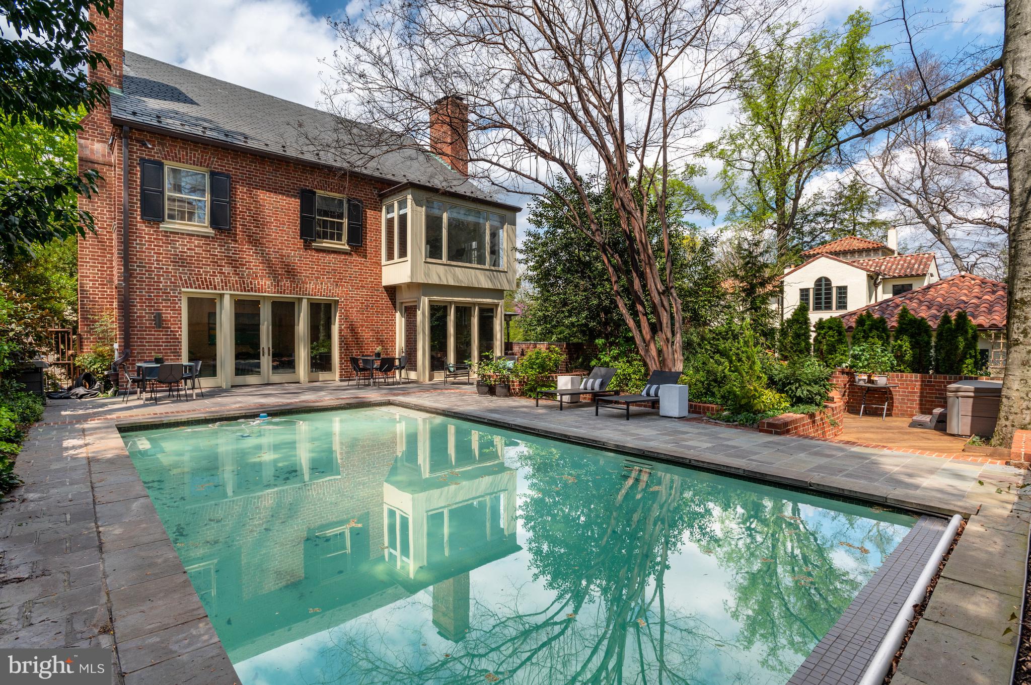 2468 Belmont Road Northwest Washington, DC 20008 - Photo 4 of 49 a view of a swimming pool with a patio