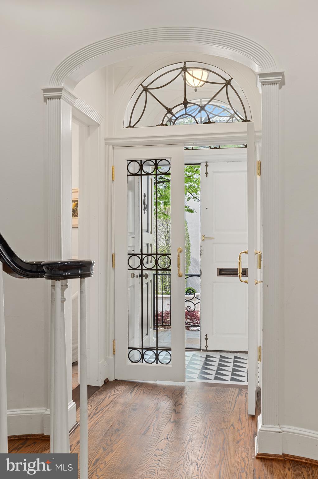 2468 Belmont Road Northwest Washington, DC 20008 - Photo 7 of 49 a view of a hallway with wooden floor and entryway