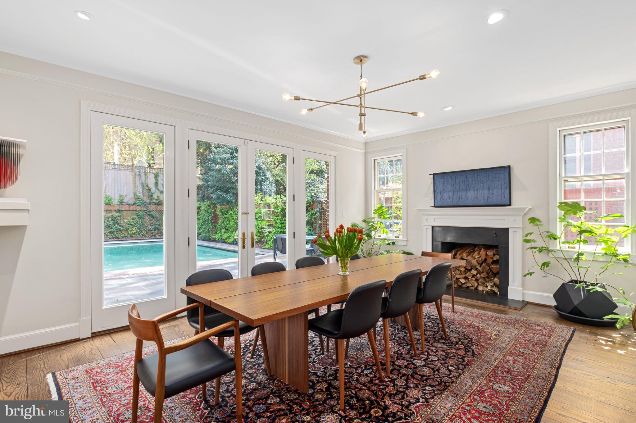 2468 Belmont Road Northwest Washington, DC 20008 - Photo 9 of 49 a view of a dining room with furniture window and wooden floor