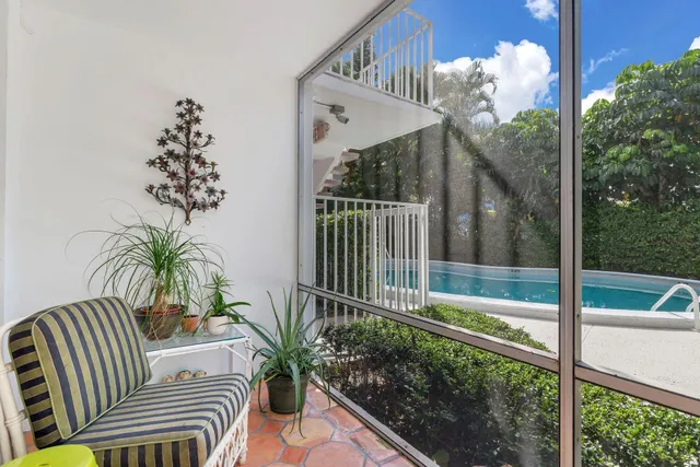 a view of a porch with a backyard