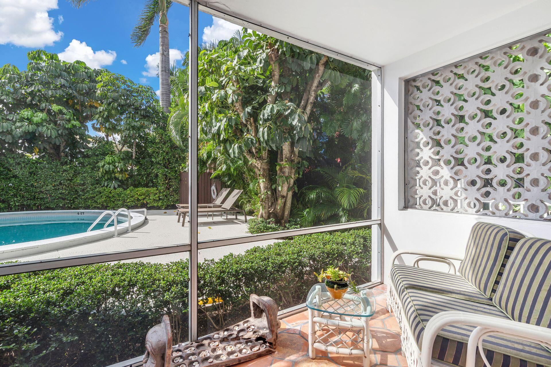 401 Peruvian Avenue, Unit 1050 Palm Beach, FL 33480 - Photo 10 of 17 a view of a patio with chair and table