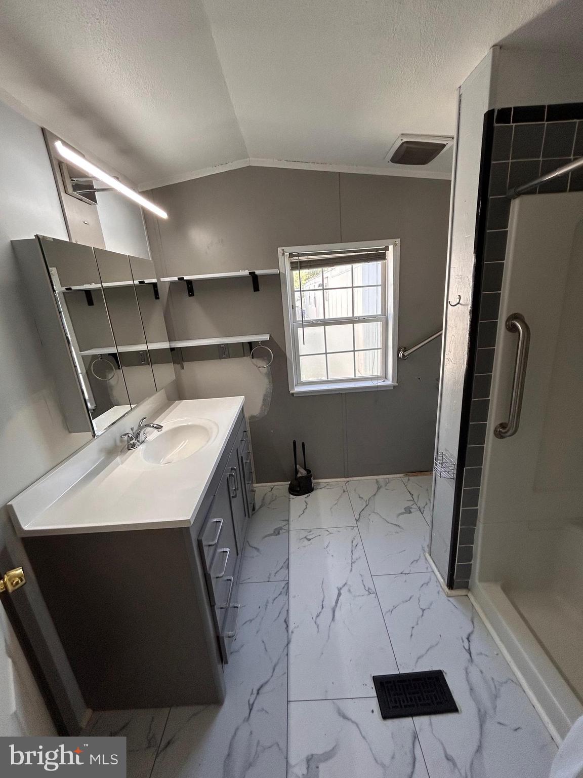 3 Vagabond Road Middletown, PA 17057 - Photo 7 of 11 a bathroom with a sink and mirror