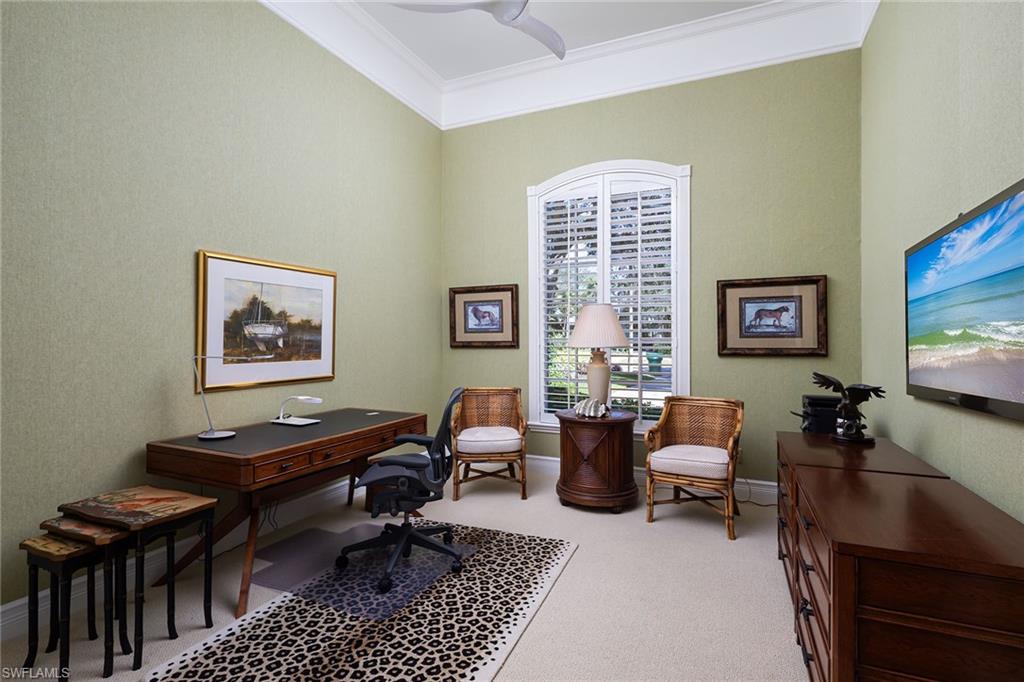 6975 Green Tree Drive Naples, FL 34108 - Photo 19 of 33 Home office with light carpet and ornamental molding