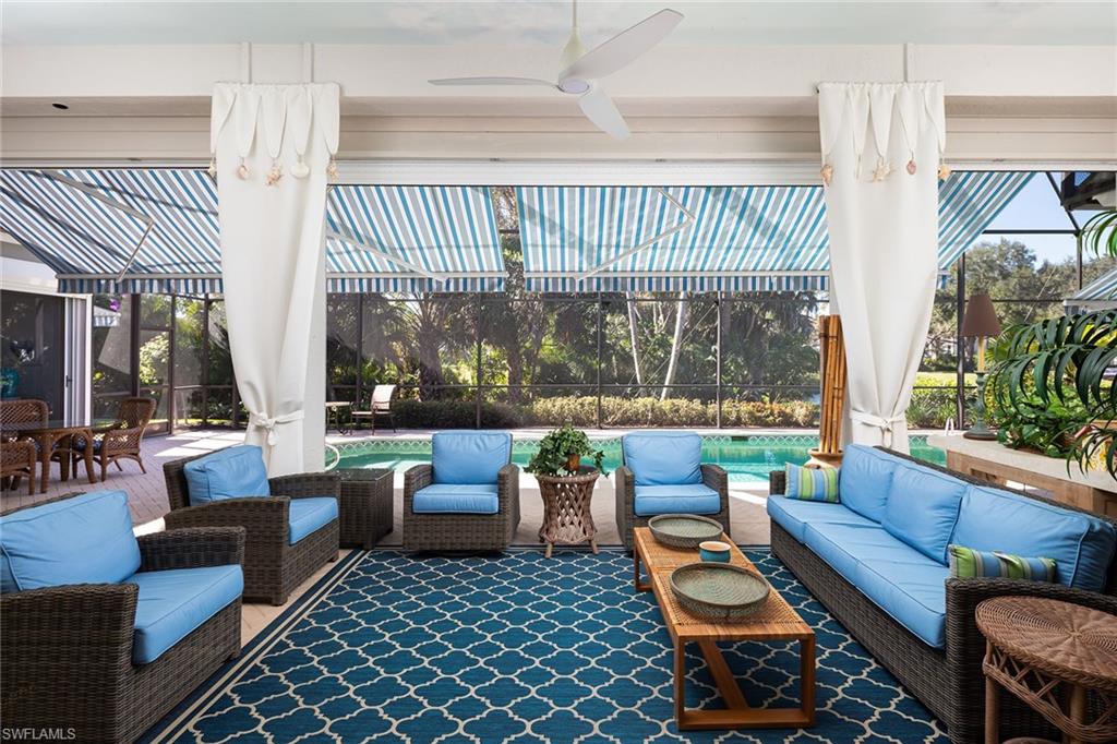 6975 Green Tree Drive Naples, FL 34108 - Photo 27 of 33 Common area featuring a sunroom