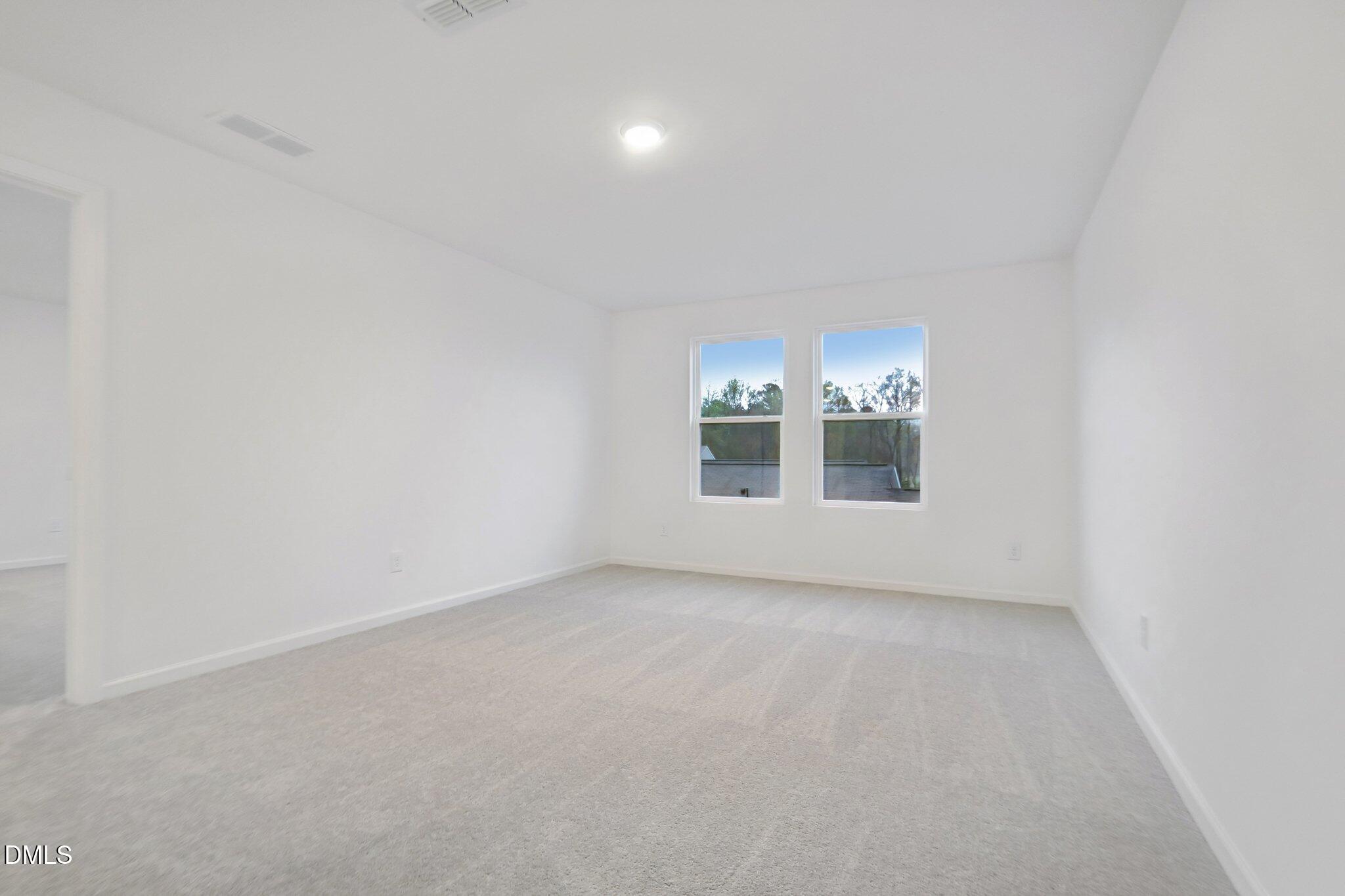 11730 Salers Loop Middlesex, NC 27557 - Photo 18 of 47 a view of an empty room with a window