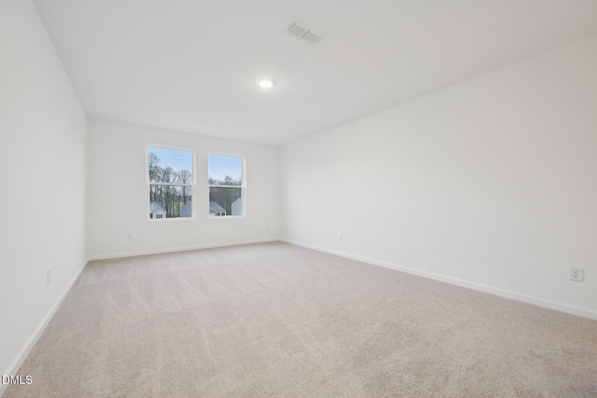 11730 Salers Loop Middlesex, NC 27557 - Photo 21 of 47 an empty room with windows