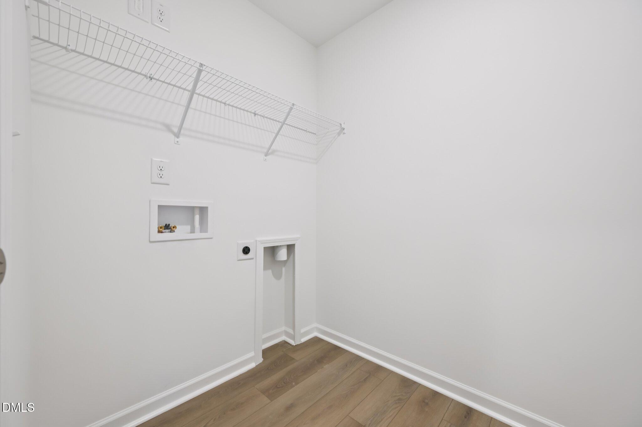 11730 Salers Loop Middlesex, NC 27557 - Photo 28 of 47 a view of a room with racks on the wall