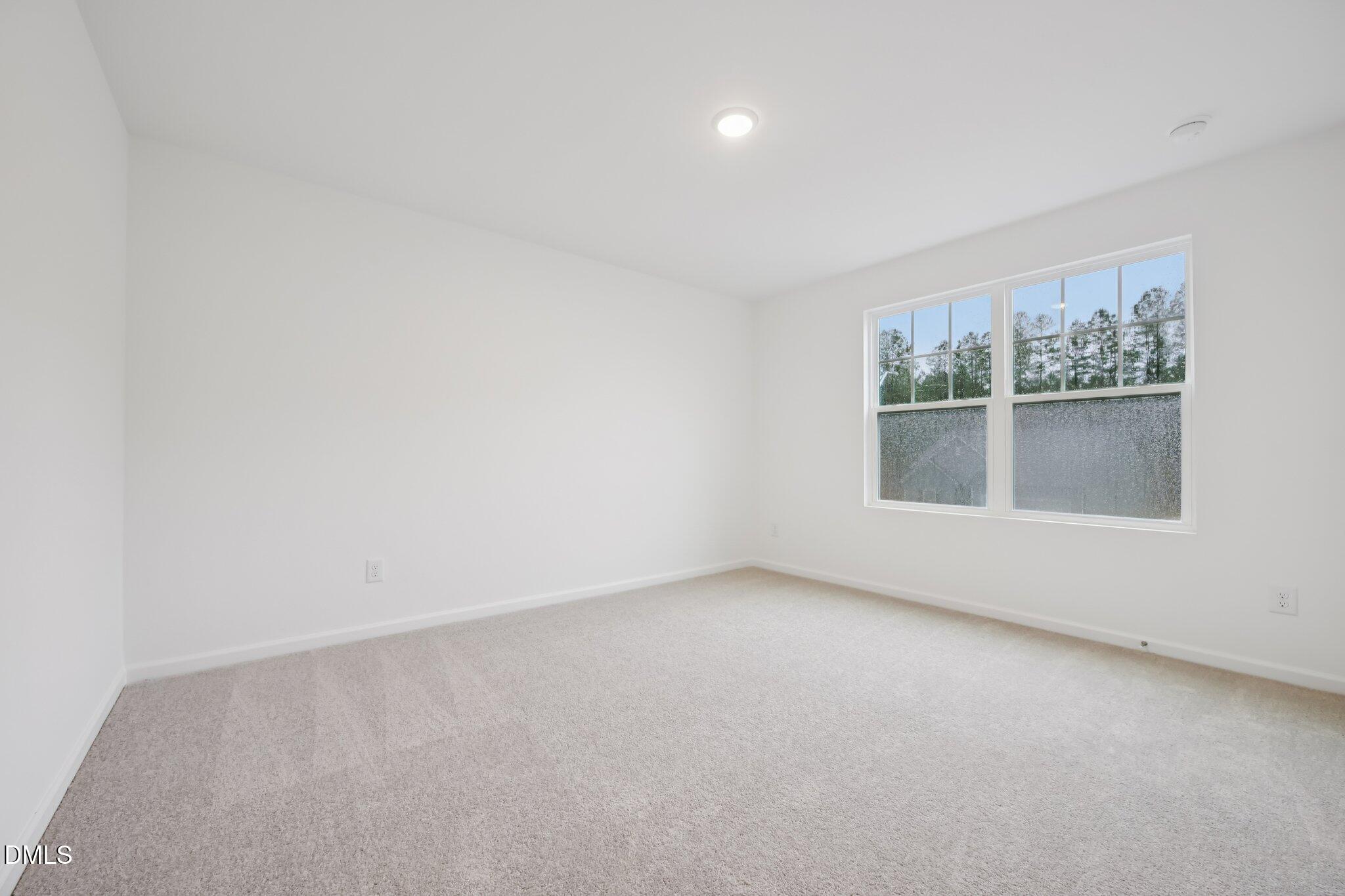 11730 Salers Loop Middlesex, NC 27557 - Photo 30 of 47 an empty room with a window