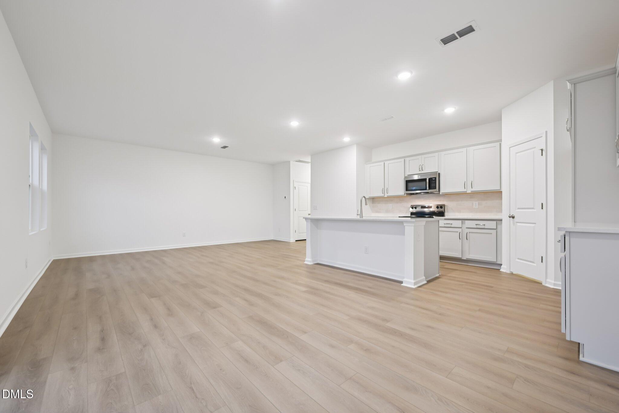 11730 Salers Loop Middlesex, NC 27557 - Photo 6 of 47 a view of kitchen with wooden floor