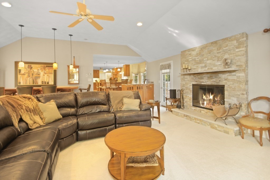 5 Judith E Lane Methuen, MA 01844 - Photo 13 of 38 a living room with furniture and a fireplace