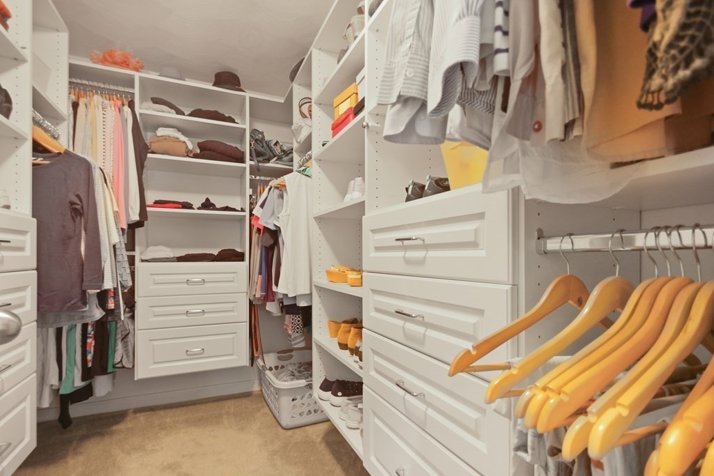 5 Judith E Lane Methuen, MA 01844 - Photo 23 of 38 a view of walk in closet with clothes
