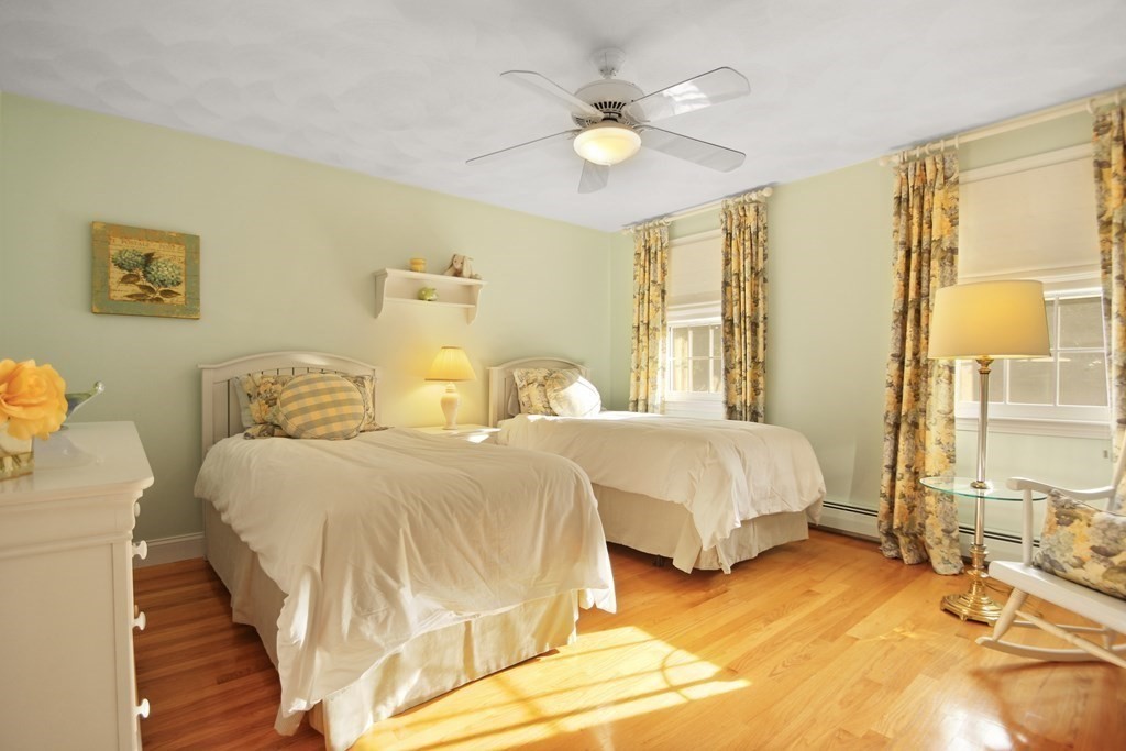 5 Judith E Lane Methuen, MA 01844 - Photo 25 of 38 a bedroom with two beds and painting on the wall