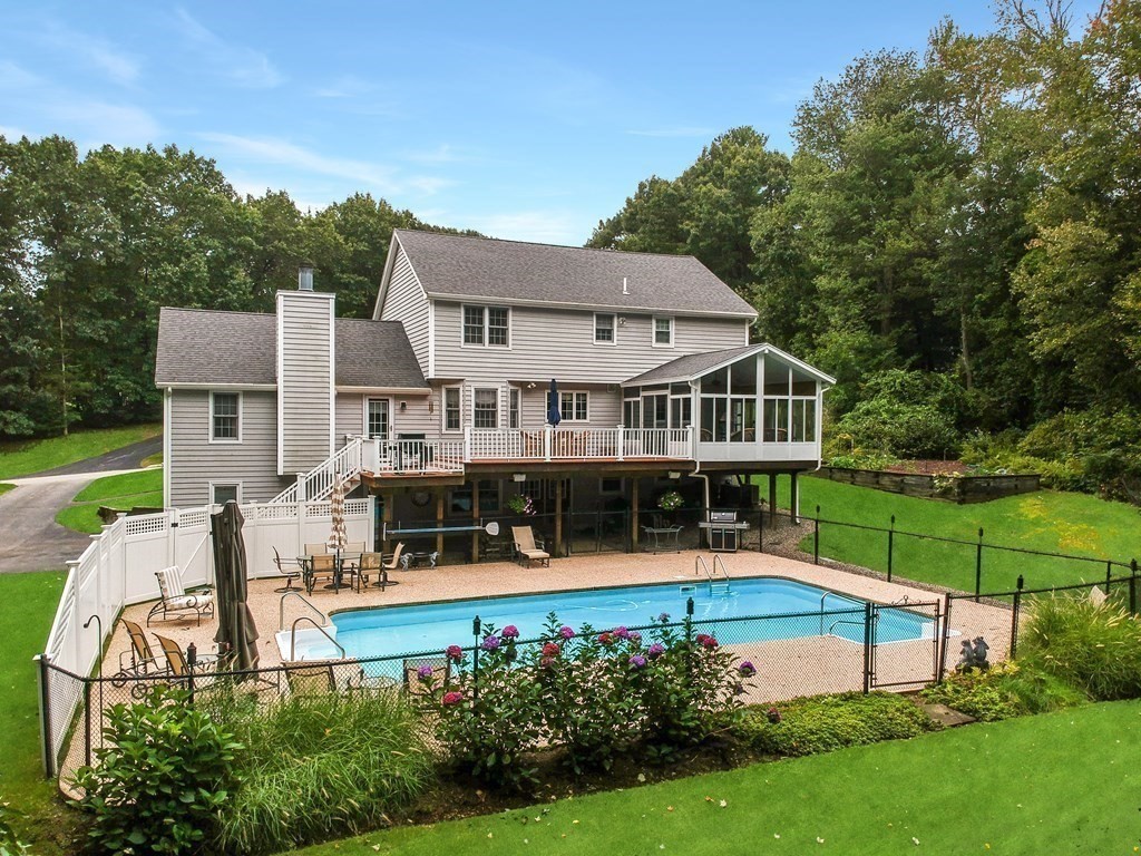5 Judith E Lane Methuen, MA 01844 - Photo 34 of 38 a view of a house with swimming pool and yard