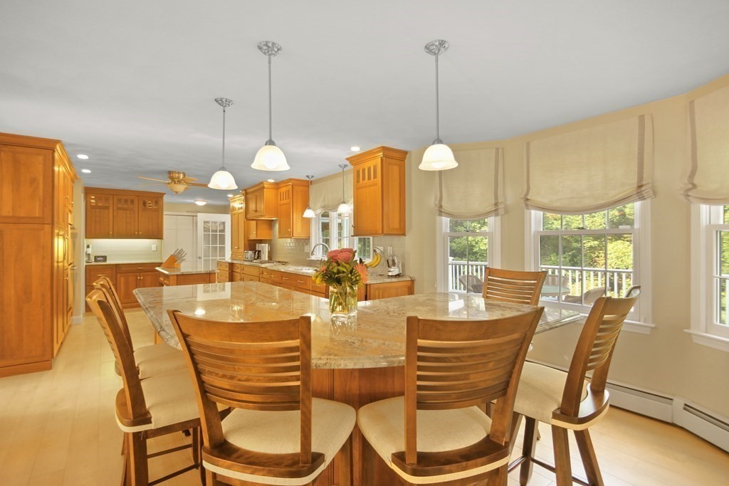 5 Judith E Lane Methuen, MA 01844 - Photo 6 of 38 a view of a dining room with furniture window and outside view