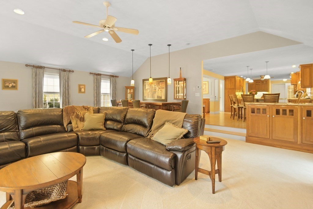 5 Judith E Lane Methuen, MA 01844 - Photo 10 of 38 a living room with furniture and kitchen view