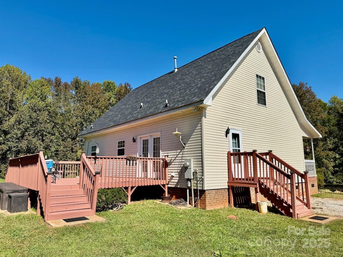 1054 Sandy Springs Road Rutherfordton, NC 28139 - Photo 2 of 33 a view of backyard with deck and outdoor seating