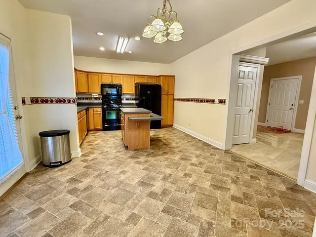 a view of a dining room with a chandelier